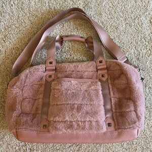 Cynthia Rowley pink faux fur travel bag